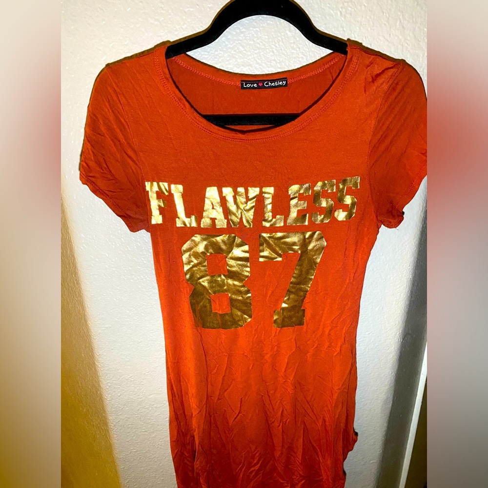 Brownish Orange Dress with Flawless in gold on the front Medium
